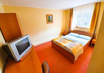 Фото номера Номер Делюкс с кроватью размера «king-size» Отель Szarvas Hotel г. Одорхею-Секуеск 4