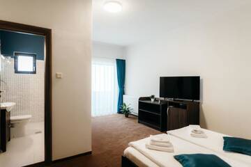 Фото номера Улучшенный двухместный номер с 1 кроватью Гостевой дом Páva Pension &amp; Spa г. Одорхею-Секуеск 5