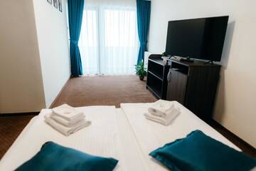 Фото номера Улучшенный двухместный номер с 1 кроватью Гостевой дом Páva Pension &amp; Spa г. Одорхею-Секуеск 3
